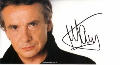 Belle photo de michel:Michel Sardou/Sérieux et charmant à la foisil a signé bien!!!