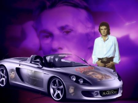Bien bell photo::Michel sardou  voiture grise m&eacute;tallis&eacute;e de sport modern' elle est belle cet voiture,ainsi que l'image,  et michel derri&egrave;re pensif� tout aussi s&eacute;rieux� mais ca ne lui enl&egrave;ve 