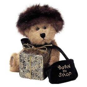 Rigoli,mimi ce ceptit Chien Bonnet sr la t&ecirc;te,fait son Shopping Cadeau dns ses pti bras,Sac BORN OT SHOP Lui N&eacute; au Magasin!Original et mignon amusant�j'aime bien la bouille sympa de de chien!!Et 