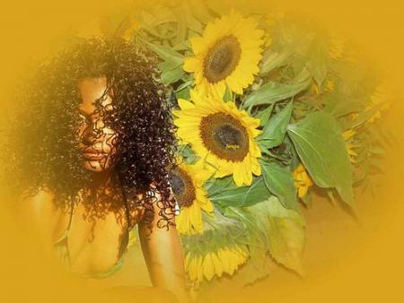Tournesols fleurs que j'aim beaucoup  et une jeune femme beau visage typ&eacute;e, cheveux noirs boucl&eacute;s  j'aim bien ce style �� &agrave; plus &bonne soir&eacute;e  bon samedi   ��mil bizz &&* 