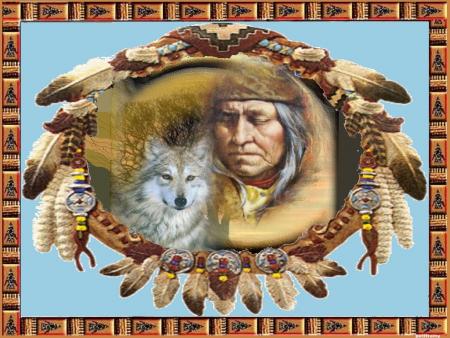 Un homme Am&eacute;rindien  pas tr&egrave;s jeune, mais  la vie  le soleil tjours  dns  son coeur et  quelle richesse  il porte en Lui ; coutumes ,  Nature, Beau  chien-loup blanc ; � beau  ttes ces plumes &&
