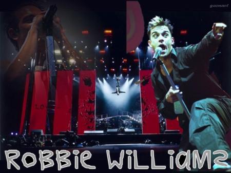 On le connait,  on adh&egrave;r ou pas, mais musique plutot  qui donn  branch&eacute;e, rythme : et qui a bien du succ&egrave;s: Robbie Williams, on le voit ici, en concert, et ambiance !!  &&