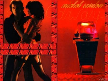 Ampoule Lumi&egrave;r rouge jaune,sous fond color&eacute; rouge noir jaune:Michel sardou bien accompagn&eacute; belle femme typ&eacute;, sensuelle�� &&